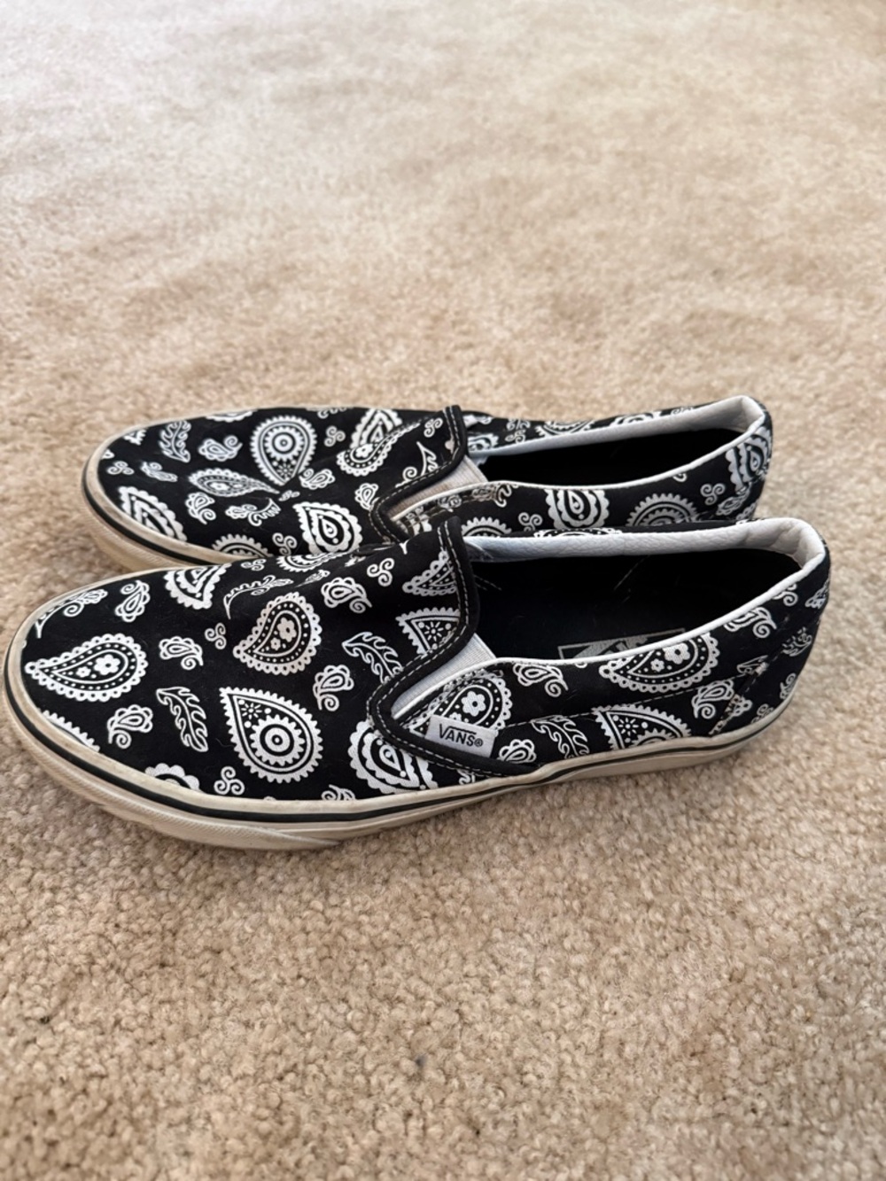 Vans Black and White Paisley Slip-On Sneakers